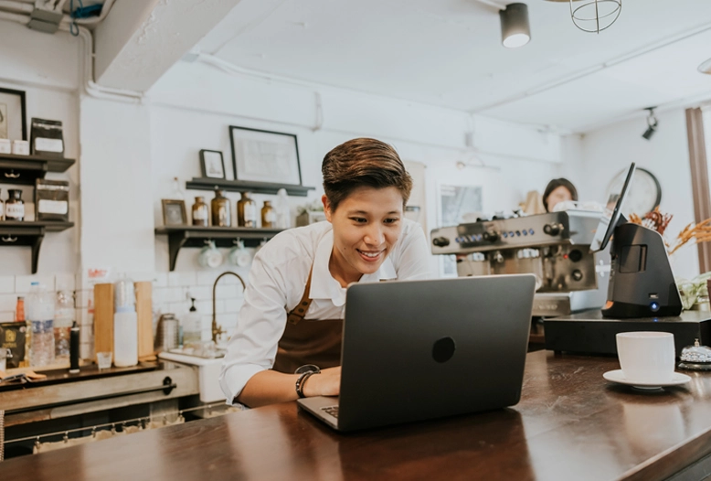 shop worker looking at computer