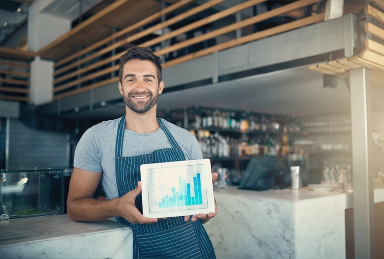 baker holding up graph